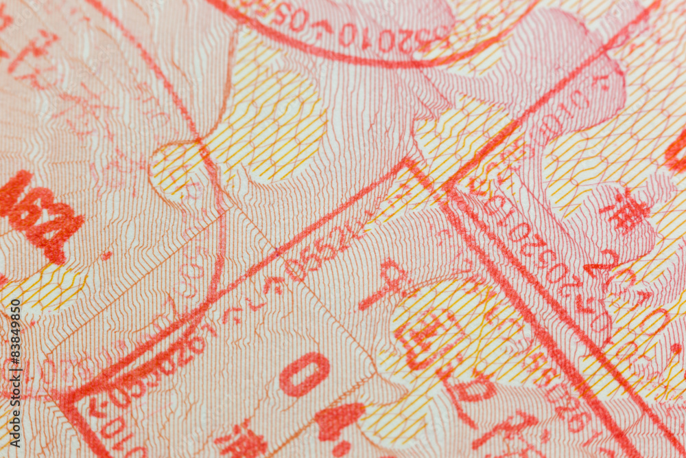 Different border stamps in a passport page - travel