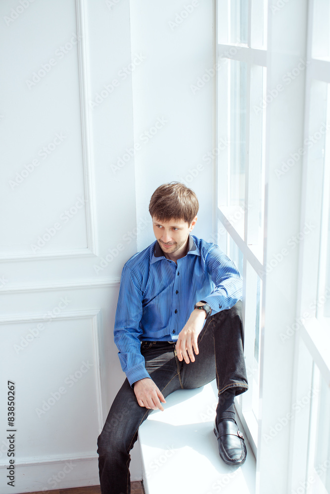 Men portrait at window Men portrait at window