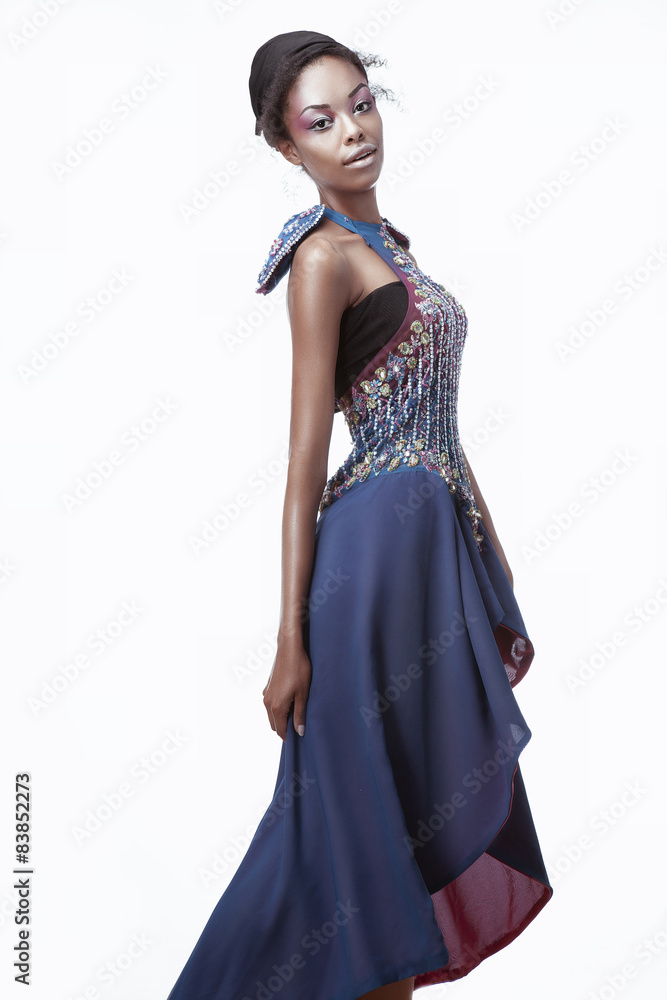 Full-length photo of beautiful black woman in a blue creative dr Full-length photo of beautiful black woman in a blue creative dr