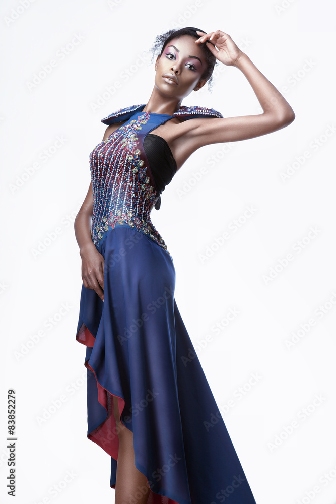 Full-length photo of beautiful black woman in a blue creative dr
