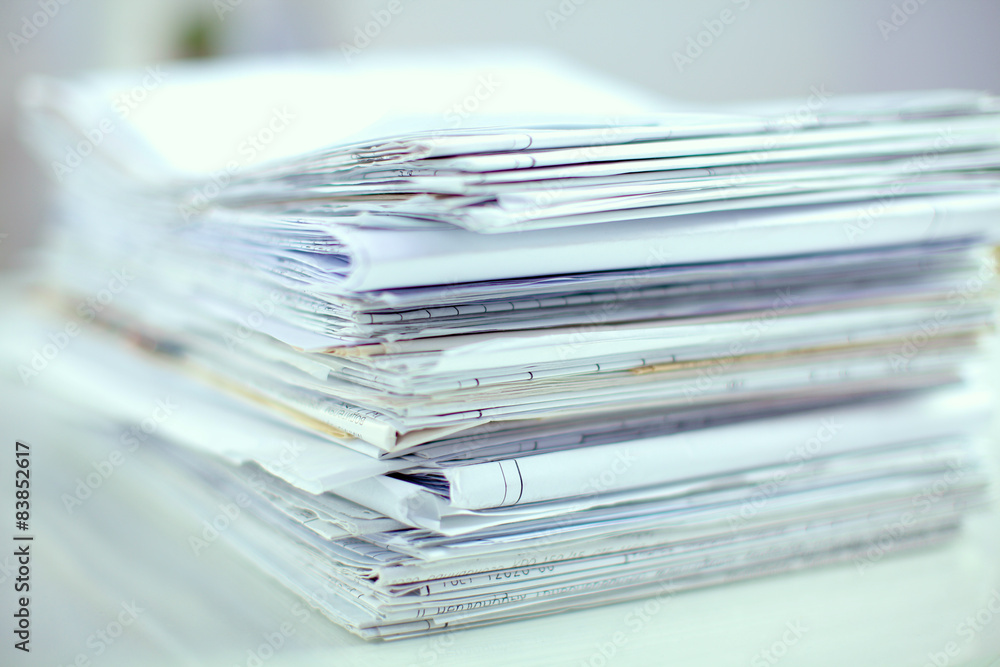 Big stack of papers ,documents on the desk Big stack of papers ,documents on the desk