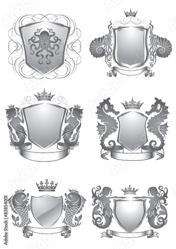 Set of silver shield silhouette on sea 