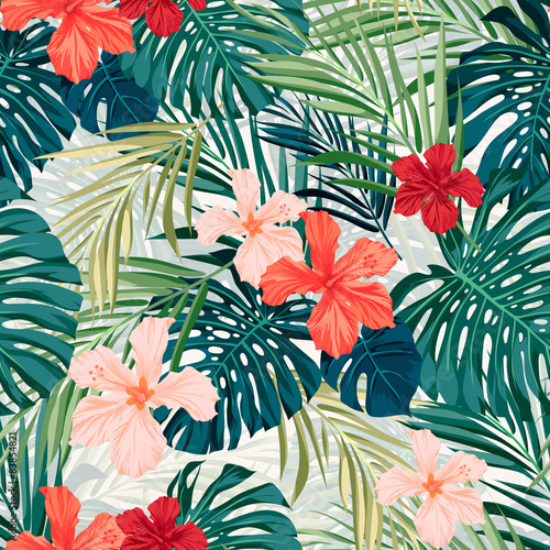 Bright colorful tropical seamless background with leaves and