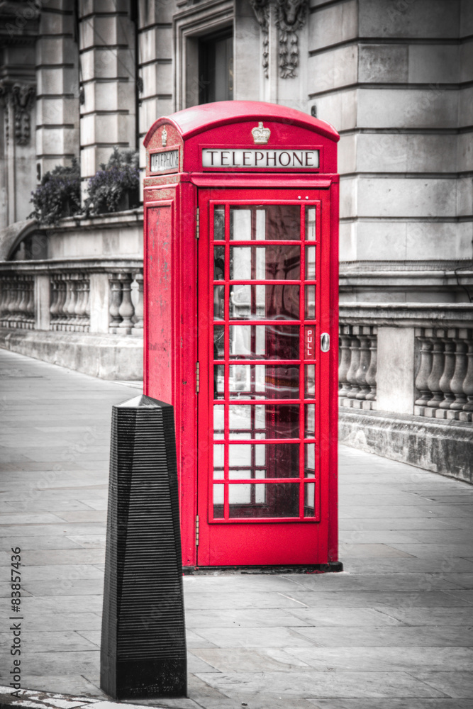 Typical red phone booth in London, UK
Typical red phone booth in London, UK