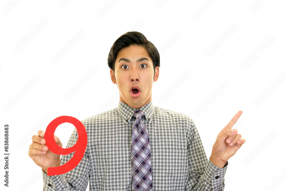 驚いた表情のビジネスマン