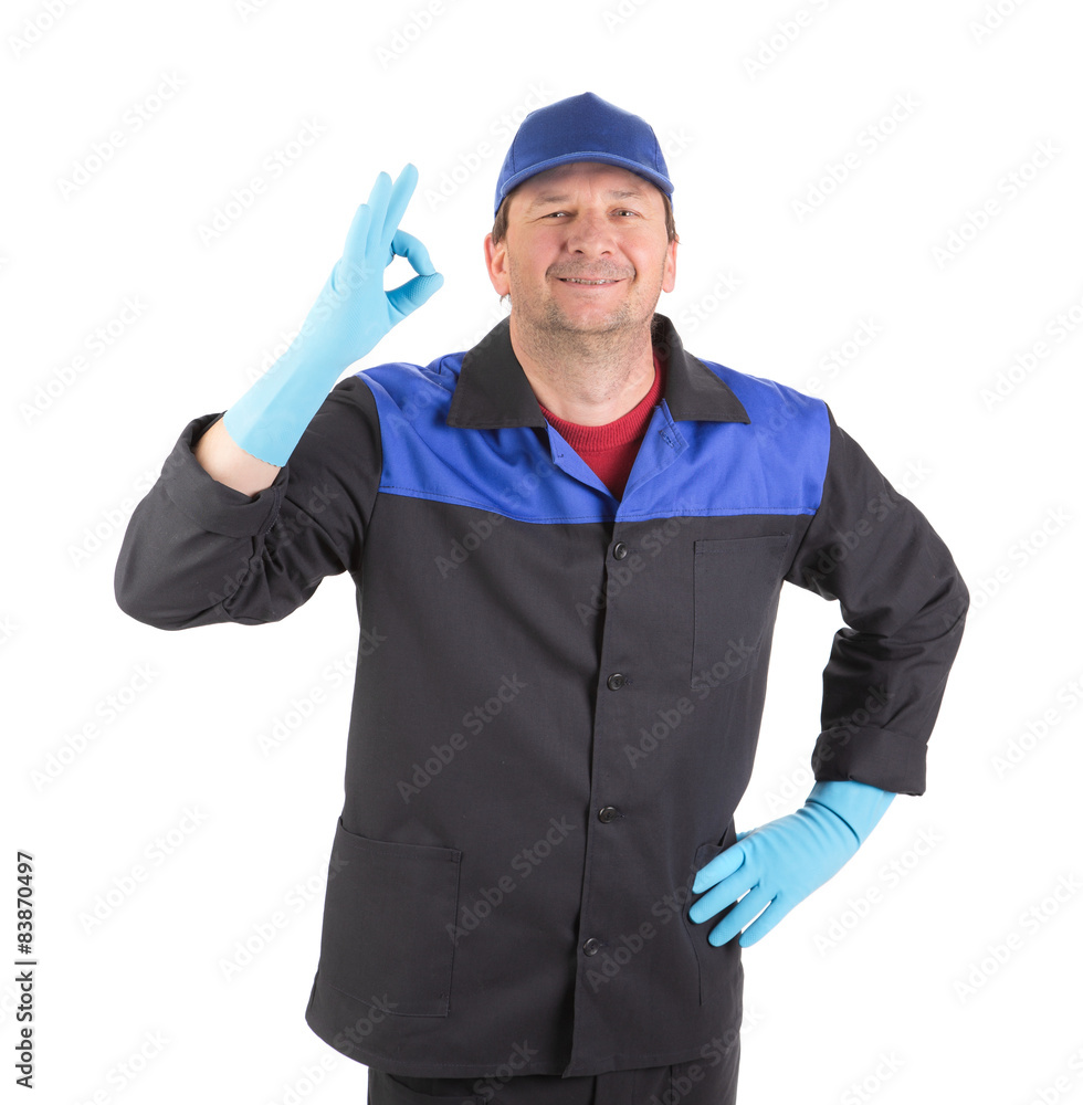 Man in blue gloves show ok sign.