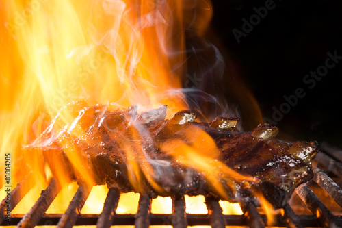 Ribs on barbecue grill © Jag_cz