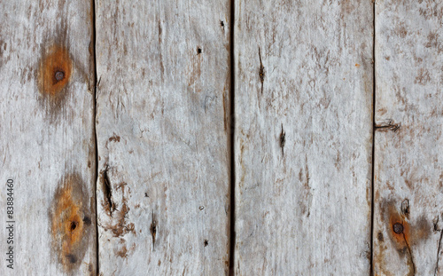 Weathered wooden background with rusty nails