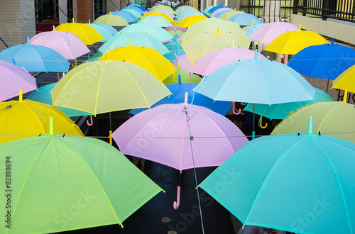 Umbrellas hanged on a lines in umbrella park