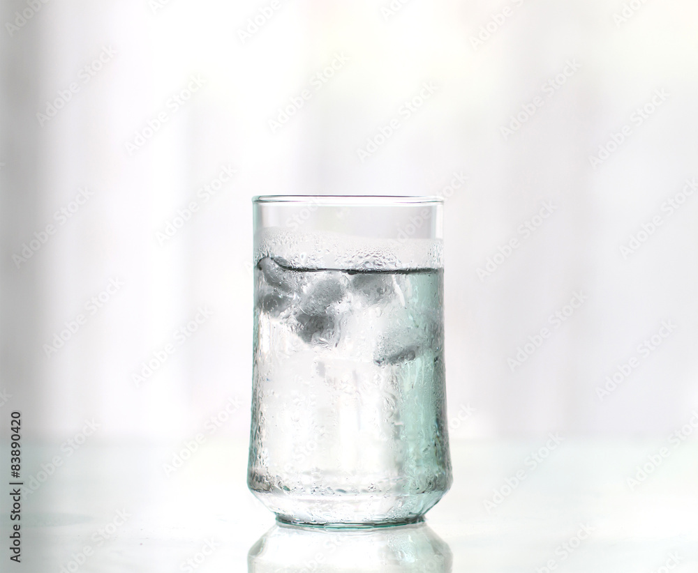 glass of Cool fresh drink with ice cube on the table glass of Cool fresh drink with ice cube on the table