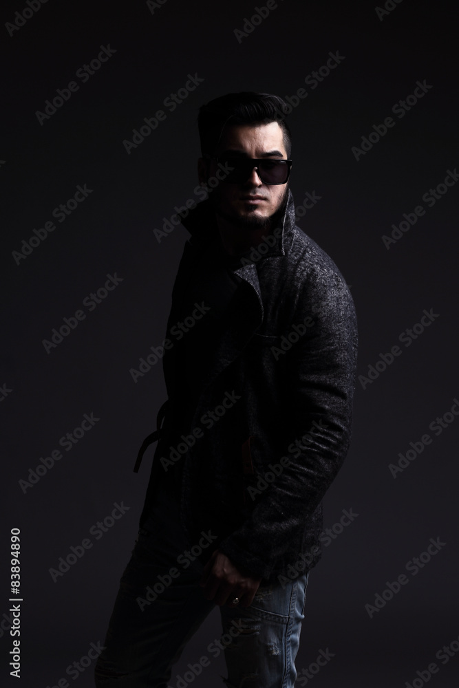 Fashion portrait of handsome stylish man in elegant jacket Fashion portrait of handsome stylish man in elegant jacket