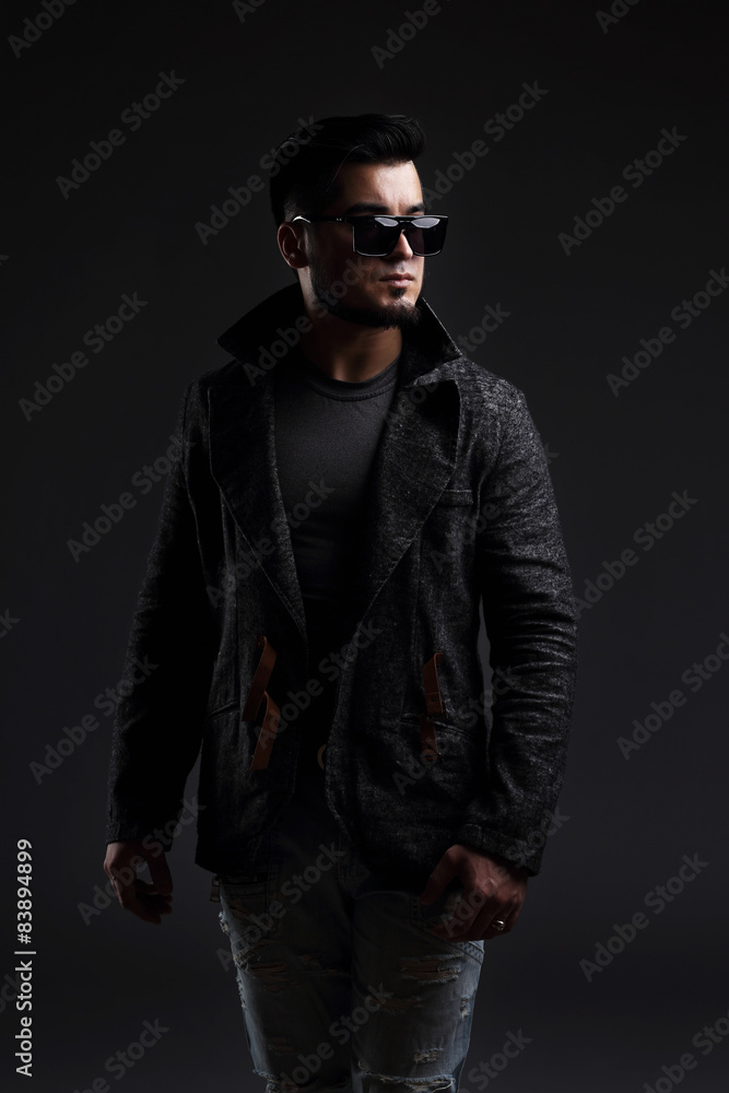Fashion portrait of handsome stylish man in elegant jacket Fashion portrait of handsome stylish man in elegant jacket