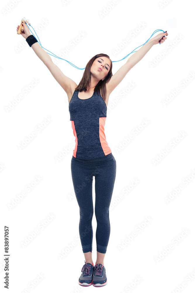 Beautiful fitness woman standing with skipping rope Beautiful fitness woman standing with skipping rope