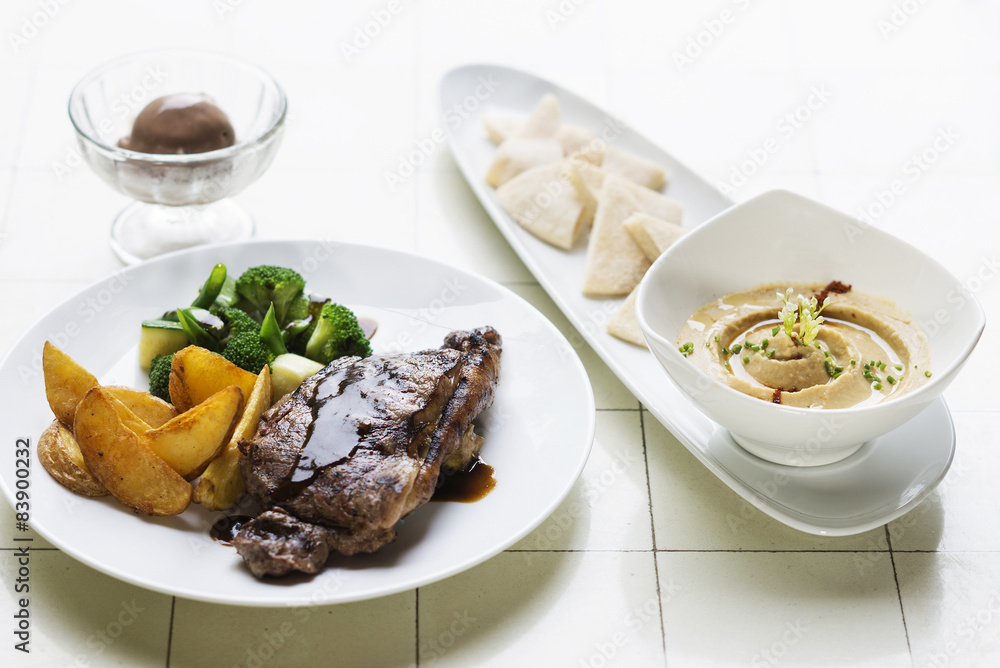 grilled steak meal with hummus dip starter grilled steak meal with hummus dip starter