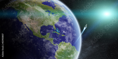 Fototapeta Naklejka Na Ścianę i Meble -  Sunrise over planet Earth in space