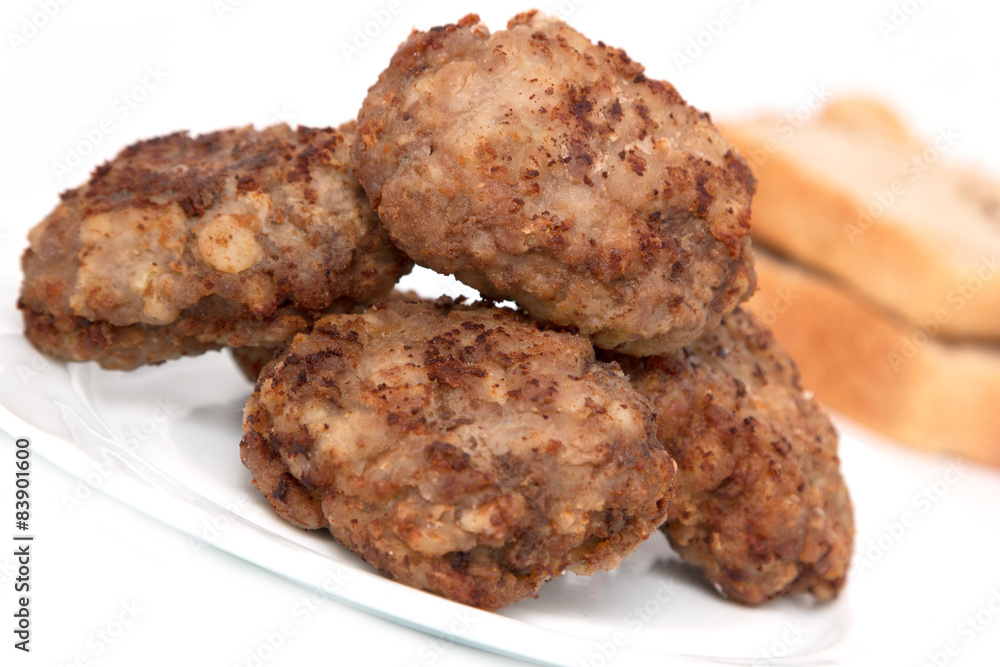 cutlet and bread on a white background cutlet and bread on a white background