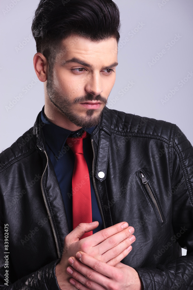handsome business man holding his hands together. handsome business man holding his hands together.