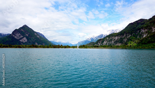 Scenery of Thun Lake and sail boat © polarbearstudio