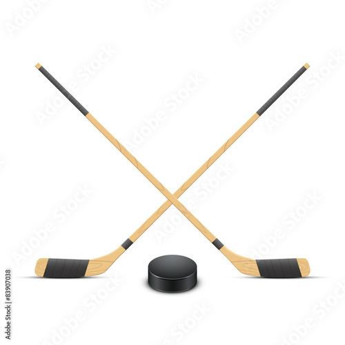 Ice Hockey puck and sticks. Vector.