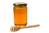 jar with honey and wooden spoon with clipping path