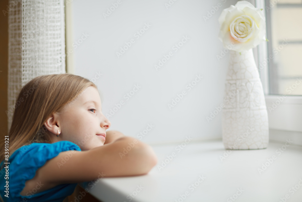 Little girl looking out the window Little girl looking out the window