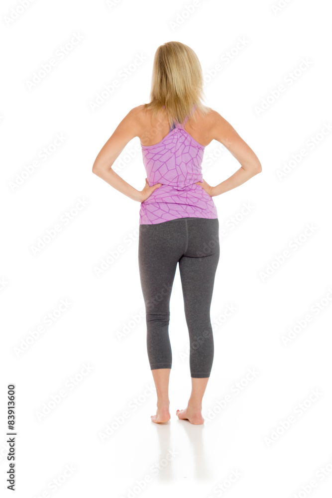 Model isolated showing her back Model isolated showing her back
