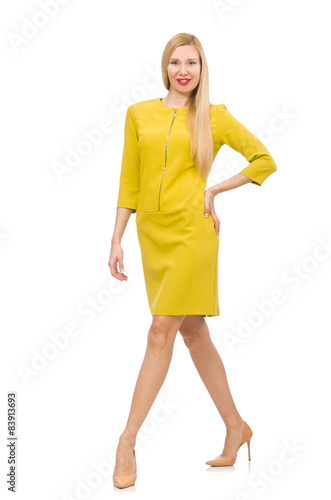 Pretty girl in yellow dress isolated on white © Elnur