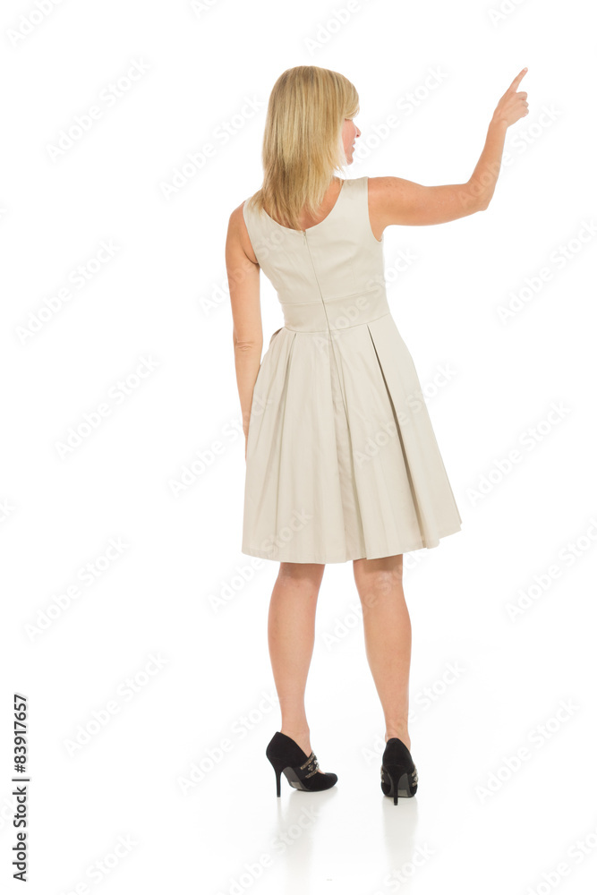 Fototapeta premium Model isolated back pointing