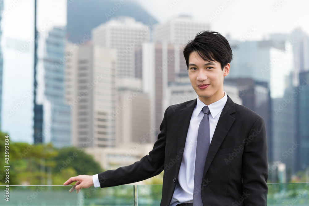Asian businessman at central district in Hong Kong Asian businessman at central district in Hong Kong