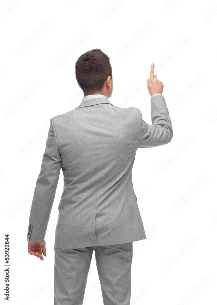 businessman pointing finger or touching something businessman pointing finger or touching something