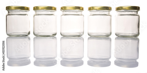 Empty mason jar over white background