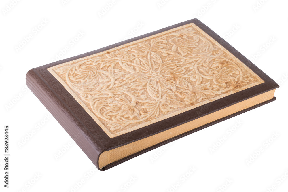 Old photo album with carved cover isolated on white background Old photo album with carved cover isolated on white background