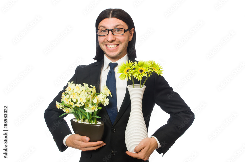 Handsome businessman with flower pot isolated on white Handsome businessman with flower pot isolated on white