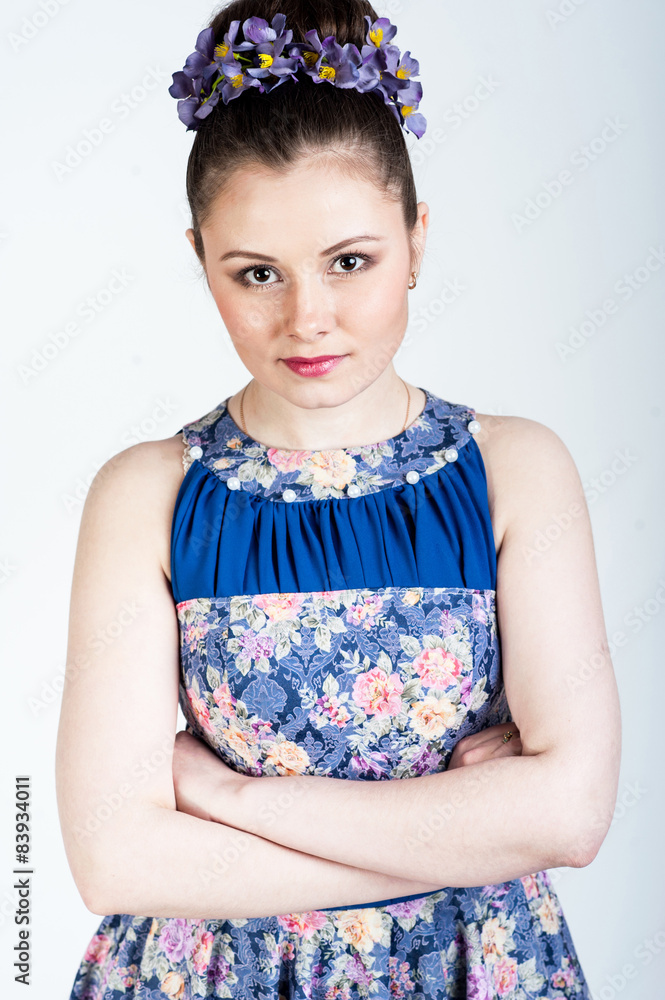 Nice girl with crosseg arms on white background Nice girl with crosseg arms on white background