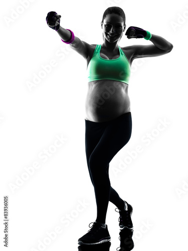 pregnant woman fitness exercises silhouette © snaptitude