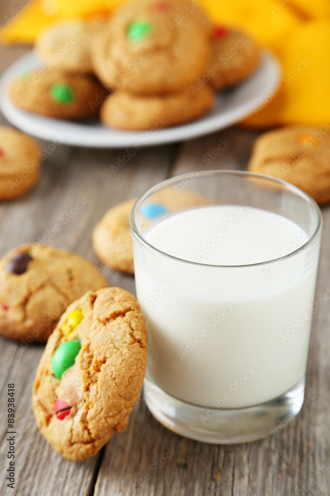 Cookies with colorful candy on grey wooden background Cookies with colorful candy on grey wooden background