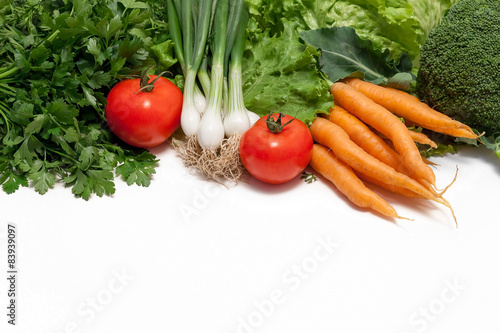 Fresh vegetables on white background with free space for text or
