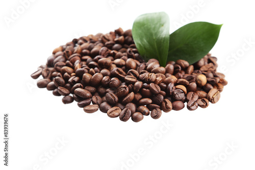 Coffee beans and leaves isolated on white