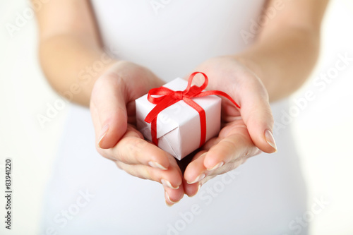 Wallpaper Mural Female hands holding gift box Torontodigital.ca