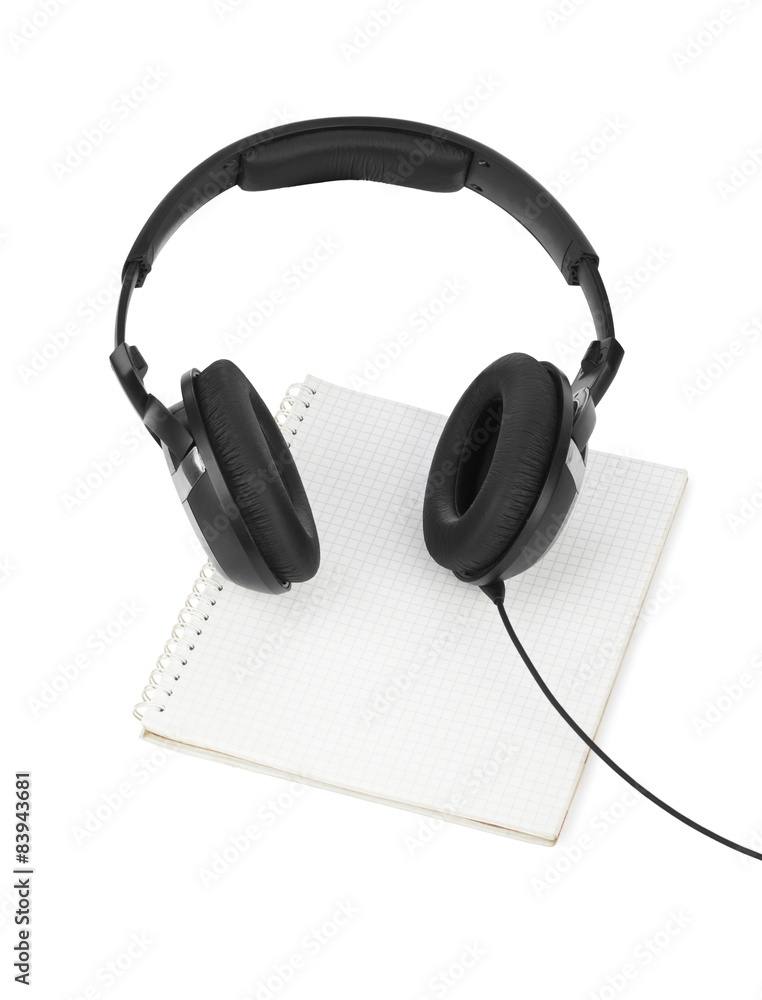Fototapeta premium Headphones and notepad