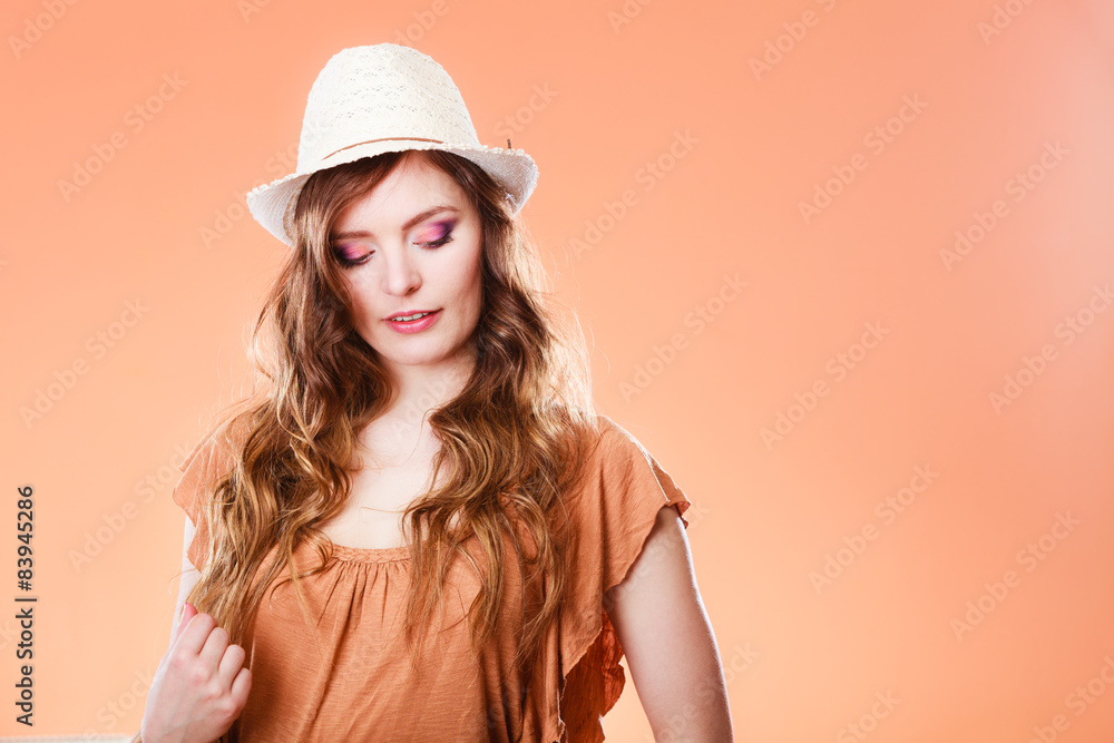 Smiling woman holds cake in hand Smiling woman holds cake in hand