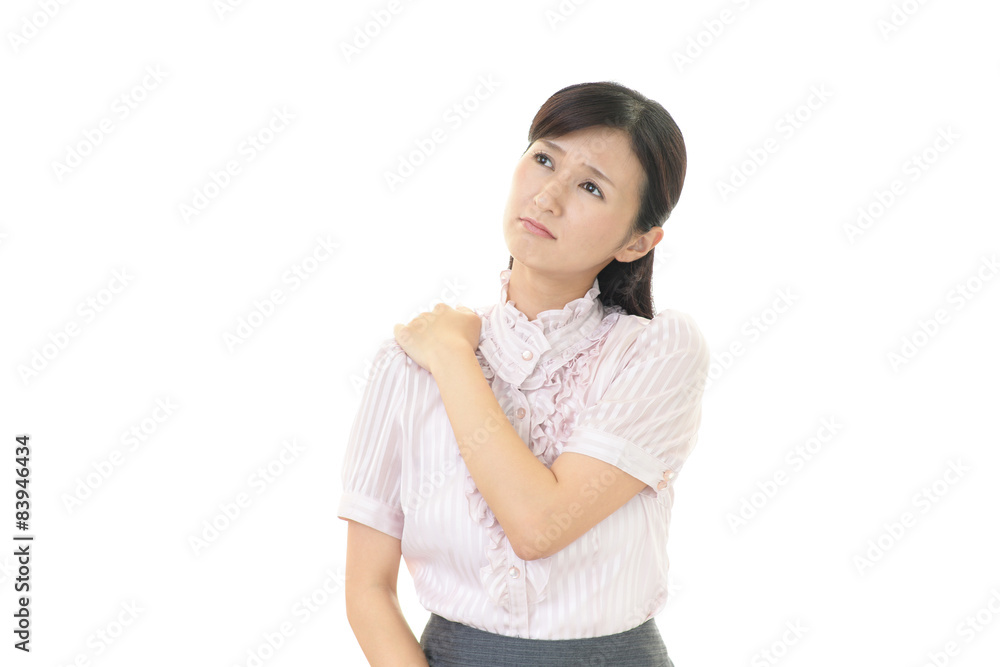 肩こりを訴える女性 肩こりを訴える女性