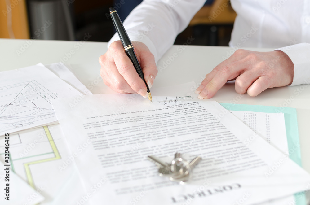 Client signing a real estate contract Client signing a real estate contract