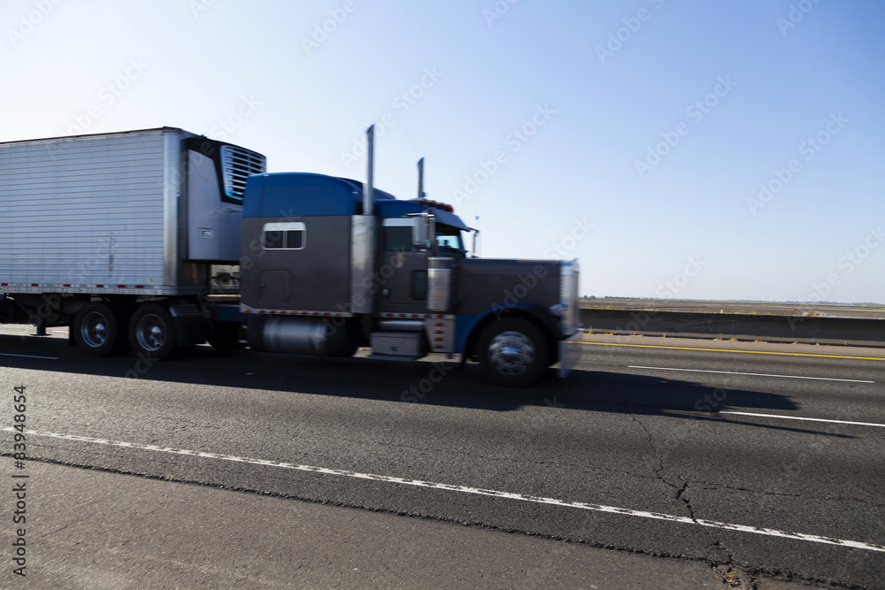 Lone Big Rig Truck On Highway Motion Blur