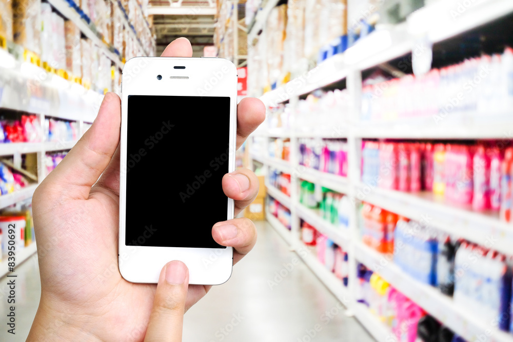 Smart phone on blur supermarket, business, technology concept Smart phone on blur supermarket, business, technology concept