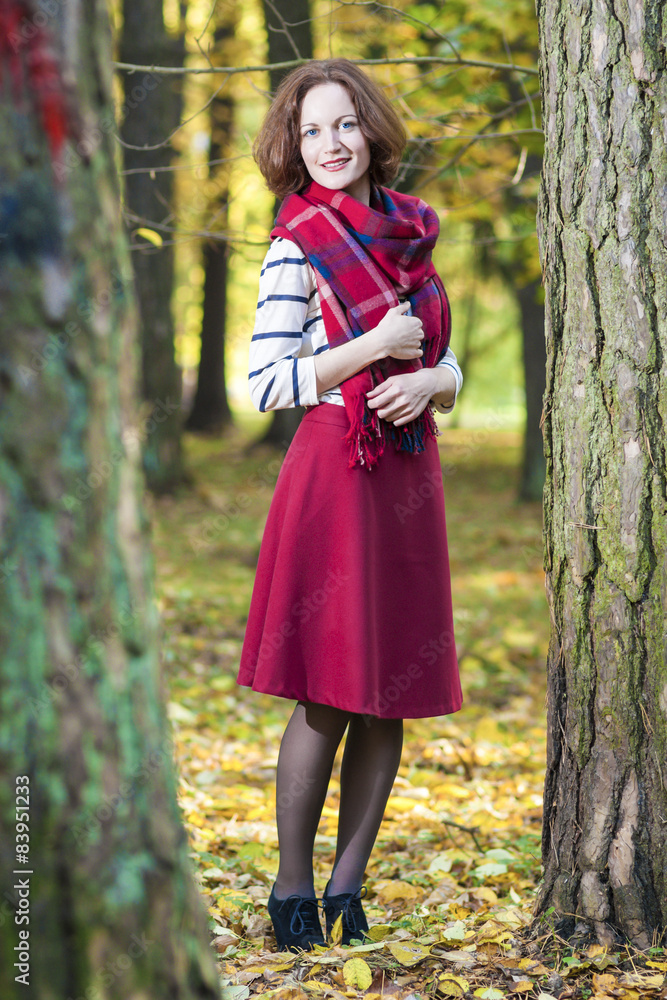 Portrait of Female Fashion Model Posing in Autumn Forest Outdoor Portrait of Female Fashion Model Posing in Autumn Forest Outdoor