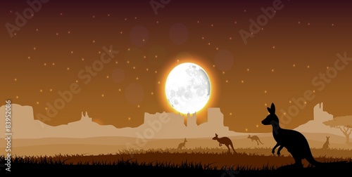  Silhouette a kangaroo the feeding in the bright dusk. Vector