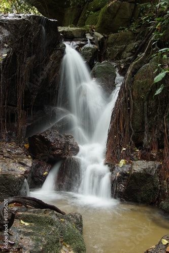 The small waterfall and rocks in forest  thailand