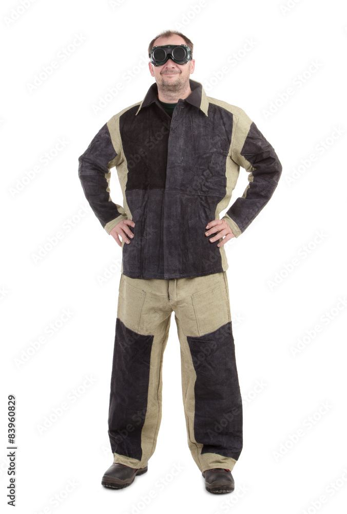 Smiling worker with arms on waist. Smiling worker with arms on waist.