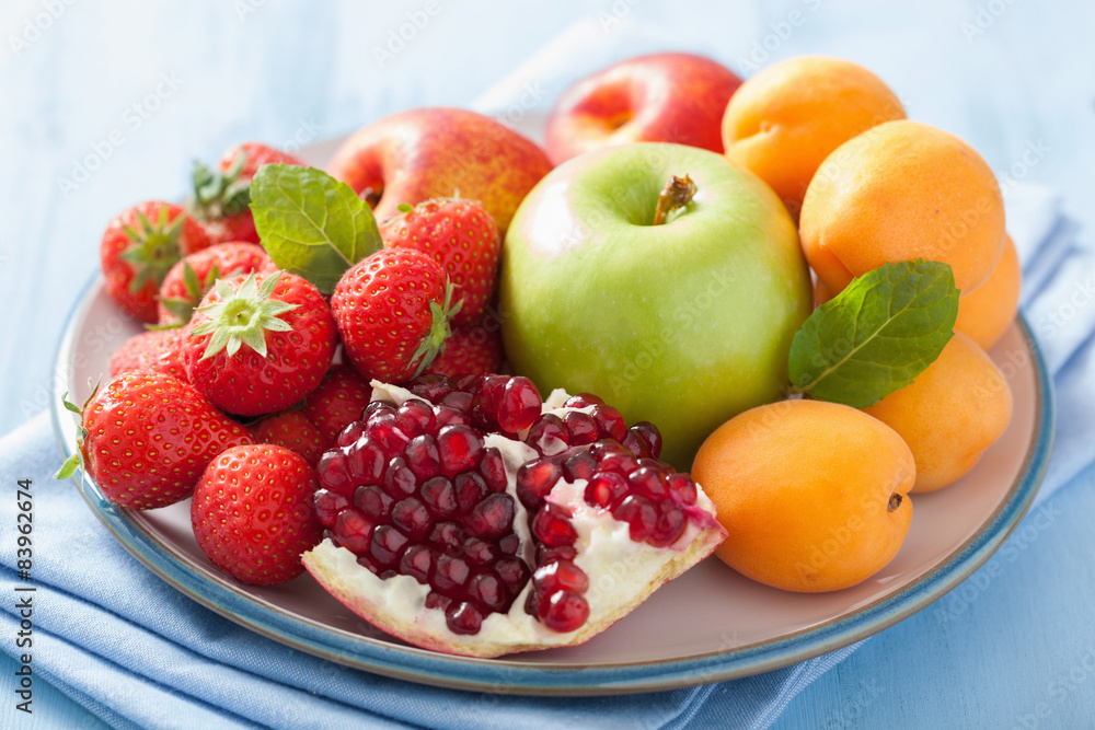 fresh fruits and berries. strawberry, apple, pomegranate fresh fruits and berries. strawberry, apple, pomegranate